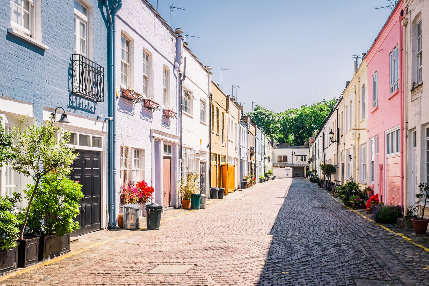 Elegant garden square lined with white period townhouses